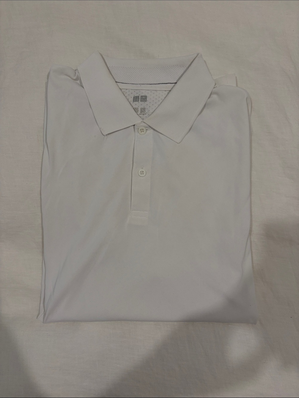 Uniqlo White Men's Polo Shirt - Minimal Pique Collar